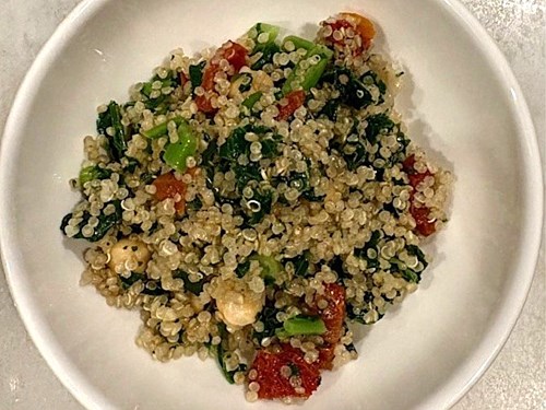 Quinoa tabbouleh salad - Traditional light salad with bulgar wheat and herbaceous mediterranean herbs